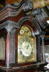 Hall_clock_architectural_hood_and_dial.jpg (152087 bytes)