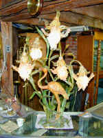 Lalique_flamingo_on_counter_lit.jpg (111908 bytes)